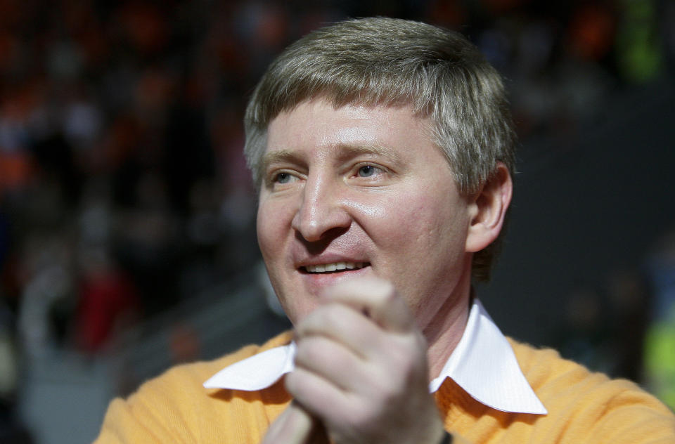 FILE Shakhtar Donetsk's Soccer Club owner billionaire Rinat Akhmetov celebrates after winning the Ukrainian Premier League soccer match against Dynamo Kiev at Donbass-Arena stadium in Donetsk, Ukraine, on Wednesday, May 5, 2010. As a political novice running to be Ukraine’s president, Volodymyr Zelenskyy vowed to reach out to Russia-backed rebels in the east who were fighting Ukrainian forces and make strides toward resolving the conflict. The assurances contributed to his landslide victory in 2019. (AP Photo/Andrey Lukatsky, File)