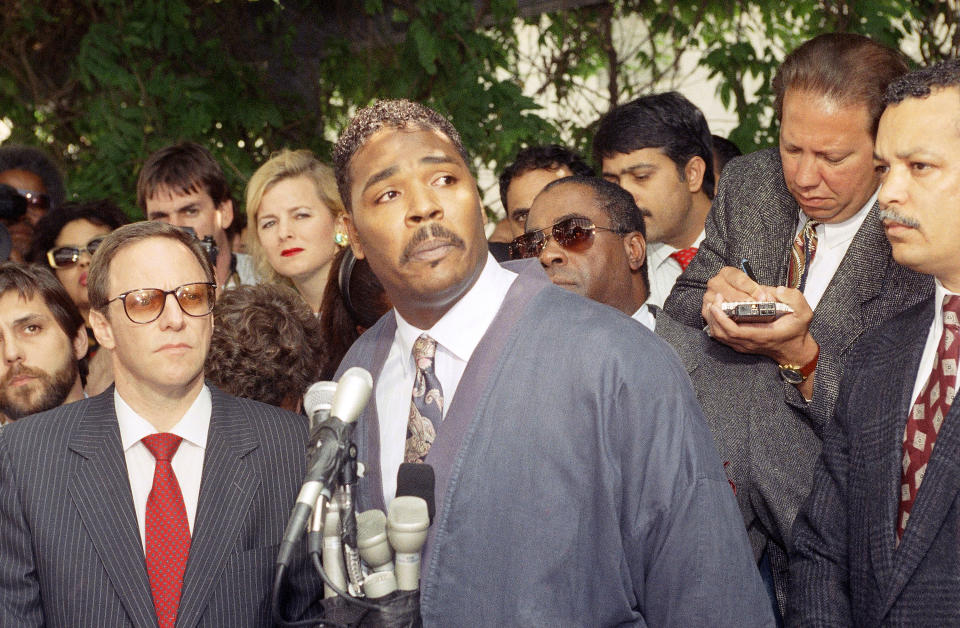 FILE - In this May 1, 1992 file photo, Rodney King makes a statement at a Los Angeles news conference, where he asked for an end to violence. For many people old enough to remember O.J. Simpson's murder trial, his 1994 exoneration was a defining moment in their understanding of race, policing and justice. Nearly three decades later, it still reflects the different realities of white and Black Americans. Simpson, who died Wednesday, April 10, 2024, remains a symbol of racial divisions in American society because he is a reminder of how deeply inequities are felt, even as newer figures have come to symbolize the struggles around racism, policing and justice. (AP Photo/David Longstreath, File)