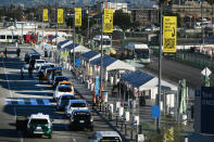 Taxis wait for arriving passengers traveling during the week of Thanksgiving, Wednesday, Nov. 22, 2023, at Los Angeles International Airport in Los Angeles. The Transportation Security Administration predicts it will screen 2.7 million passengers on Wednesday and a record 2.9 million on Sunday, the most significant day for return trips. (AP Photo/Damian Dovarganes)