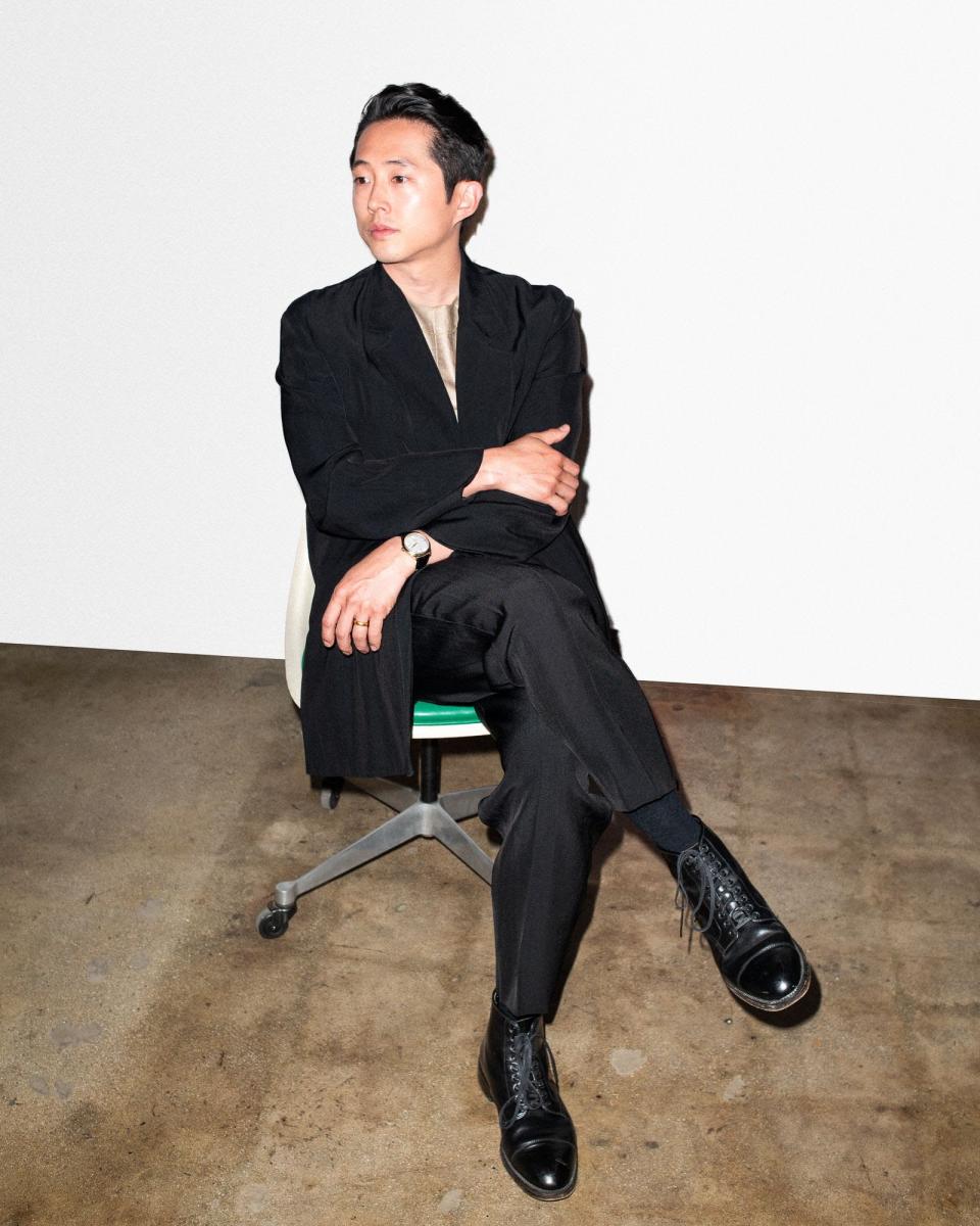 Steven Yeun in Dunhill and an Omega watch