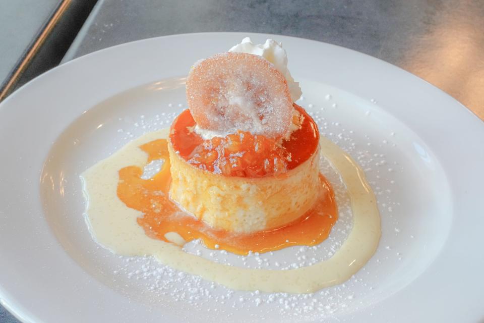 Otra's flan is a Spanish custard topped with unsweetened whipped cream. It's on the Restaurant Weeks menu.