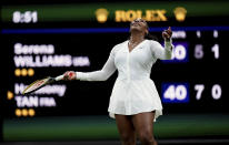 Serena Williams of the US reacts as she plays France's Harmony Tan in a first round women’s singles match on day two of the Wimbledon tennis championships in London, Tuesday, June 28, 2022. (John Walton/PA via AP)