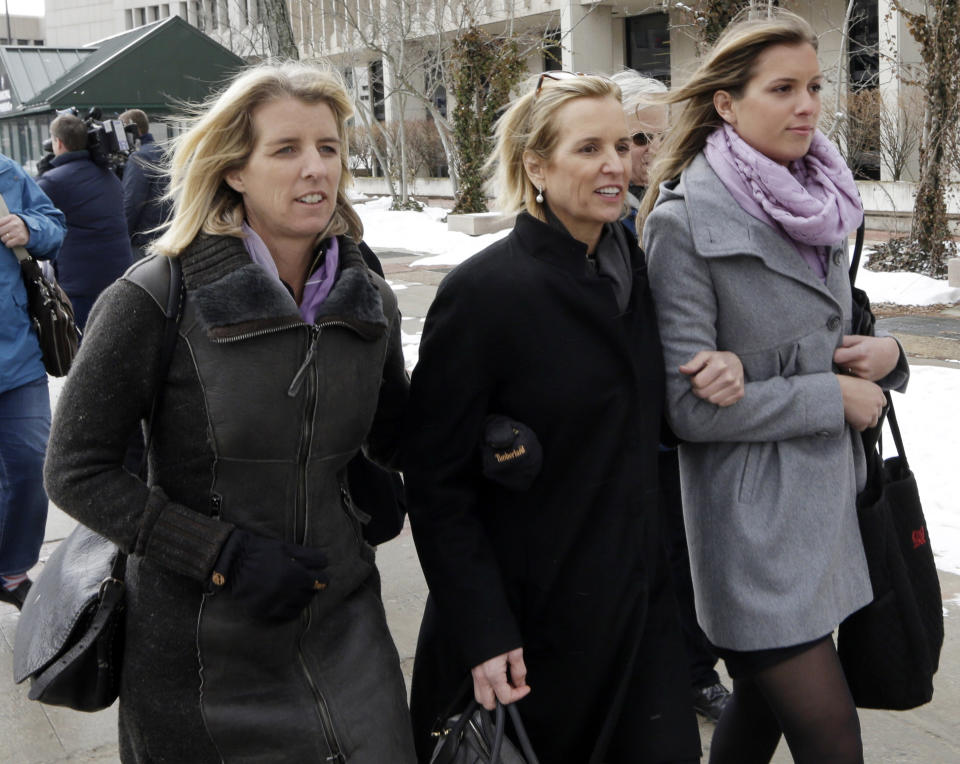 Kerry Kennedy, center, leaves Westchester County courthouse with family Wednesday, Feb. 26, 2014, in White Plains, N.Y. Kennedy testified Wednesday that she did not knowingly take a sleeping pill on the day her Lexus swerved into a tractor-trailer on a suburban New York highway. (AP Photo/Frank Franklin II)