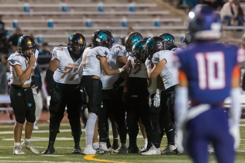 Pebble Hills' Gael Ochoa (4) talks to his team at a high school football game against Eastlake at the SISD Student Activities Complex on Thursday, Oct. 27, 2022.