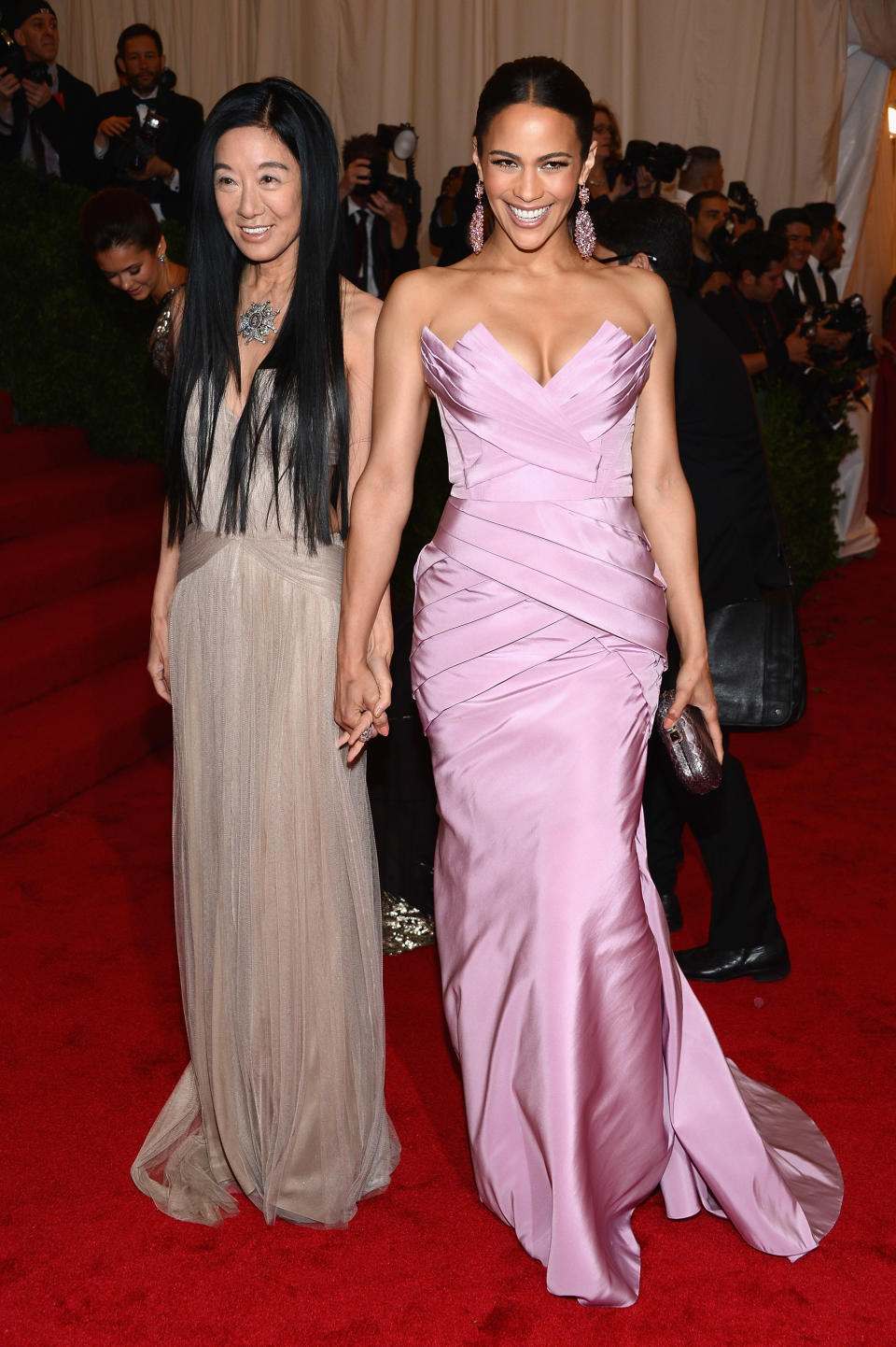 BEST: Paula Patton stands with the designer of her dress, Vera Wang, on the red carpet. The bright lilac dress with structural accents made it edgy but not overdone.