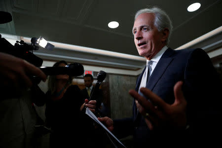 FILE PHOTO: Sen. Bob Corker (R-TN) speaks with reporters after announcing his retirement at the conclusion of his term on Capitol Hill in Washington, U.S., September 26, 2017. REUTERS/Aaron P. Bernstein