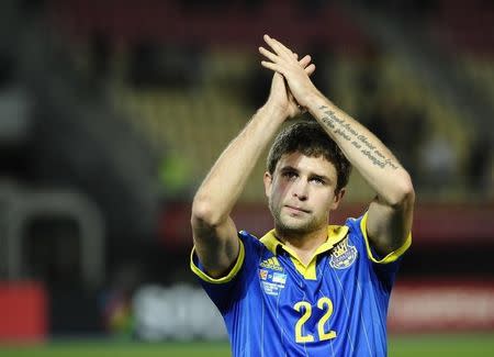 Ukraine's Artem Kravets celebrates after winning their Euro 2016 Group C qualification match against Macedonia in Skopje, Macedonia, October 9, 2015. REUTERS/Ognen Teofilovski