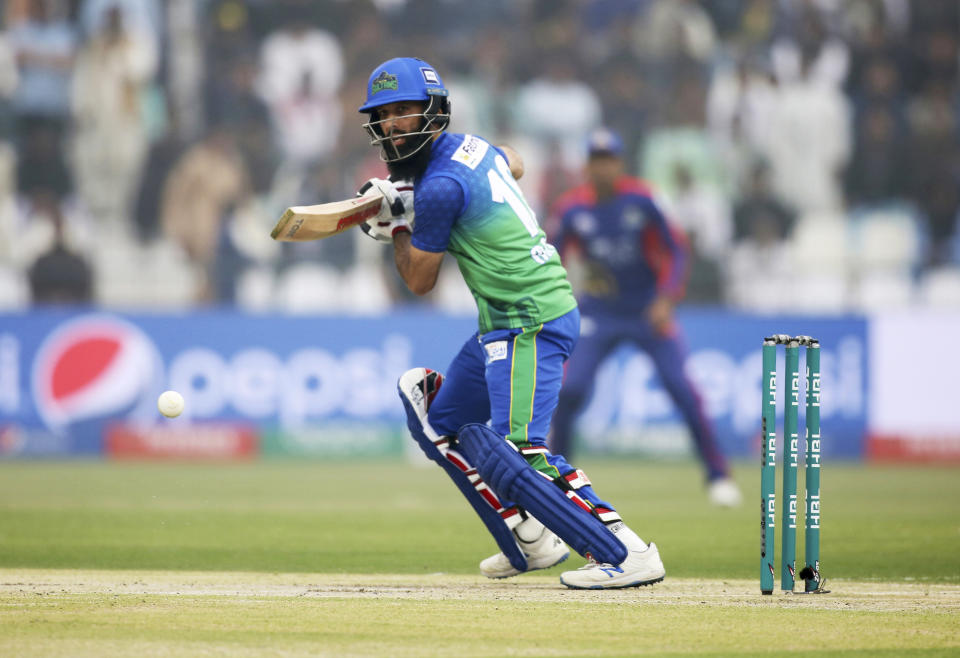 Moeen Ali of Multan Sultan hits boundary against Karachi Kings during the Pakistan Super League T20 cricket match in Multan, Pakistan, Friday, Feb. 28, 2020. (AP Photo/K.M. Chaudary)