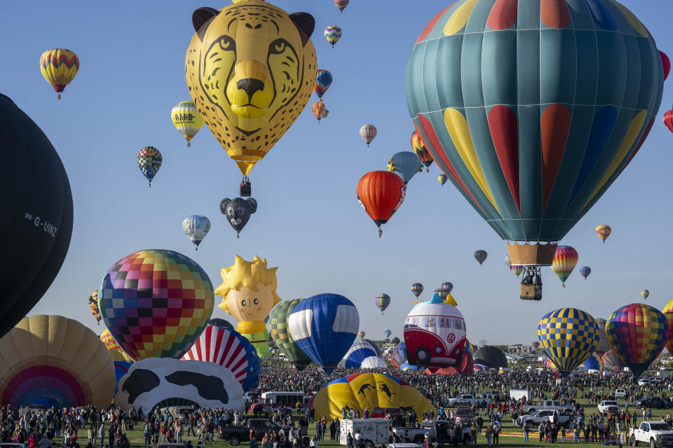 Nearly 500 balloons begin to take off during the Albuquerque International Balloon Fiesta, Saturday, Oct. 7, 2023 in Albuquerque, N.M. (AP Photo/Roberto E. Rosales)