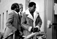 FILE - In this Nov. 8, 1985 file photo, Rubin "Hurricane" Carter, right, the former middleweight boxer, is escorted into federal court in Newark, N.J. Carter, who spent almost 20 years in jail after twice being convicted of a triple murder he denied committing, died at his home in Toronto, Sunday, April 20, 2014, according to long-time friend and co-accused John Artis. He was 76. (AP Photo/File)