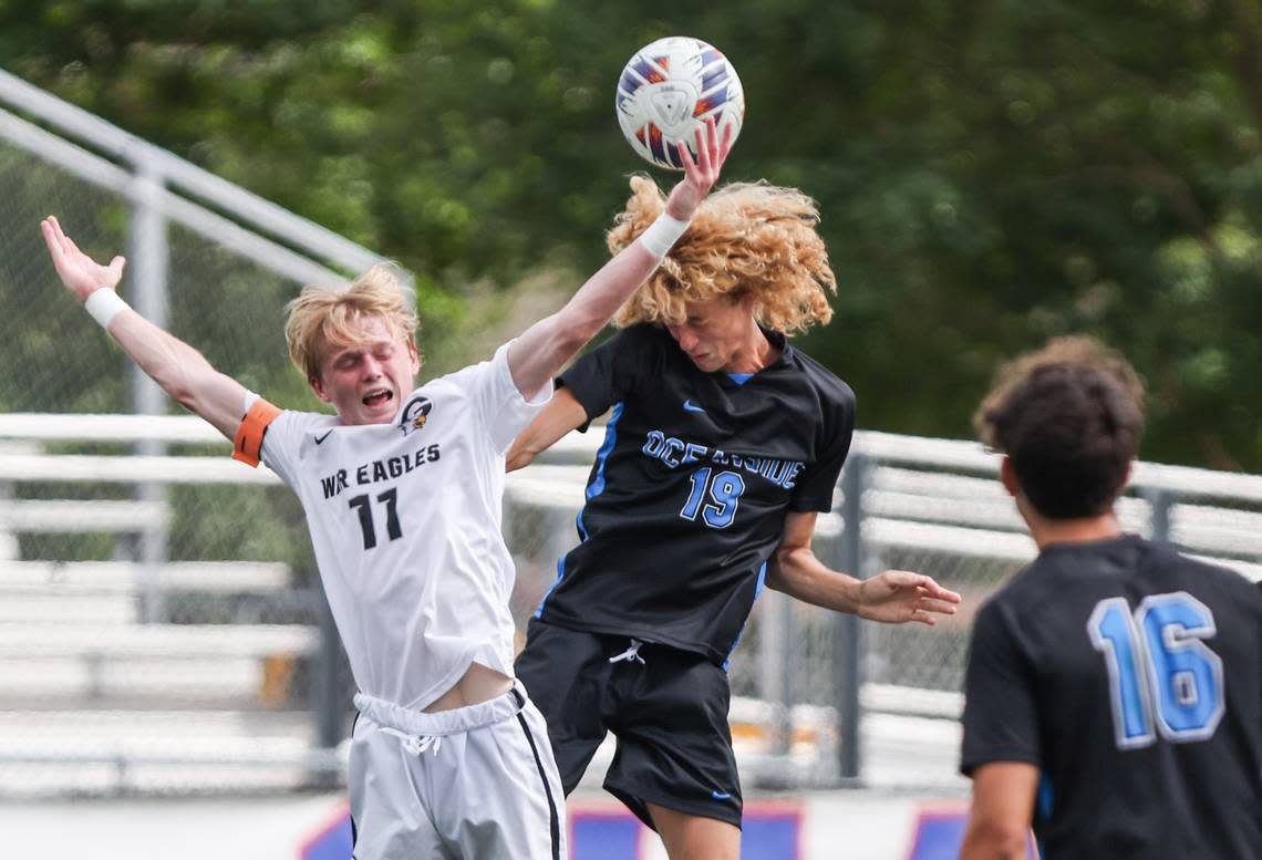 Ben Richards (11) of Gray Collegiate collides with Brady Engelking (19) of Oceanside Collegiate while going up for a header during the SCHSL Class 2A Boys State Soccer Championship between Oceanside Collegiate and Gray Collegiate at Irmo High School on Saturday, May 13, 2023.