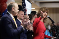 Susan Hutchison, right, the Republican challenging Sen. Maria Cantwell, D-Wash., for her U.S. Senate seat, speaks Tuesday, Nov. 6, 2018, at a Republican election-night gathering in Issaquah, Wash. (AP Photo/Ted S. Warren)