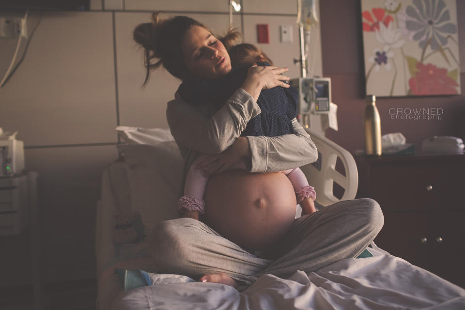 <p>You might think that giving birth for the first time is going to be the most emotional moment of your life. But earlier this year a beautifully captured photograph offered proof that giving your first, second or even third born child a sibling is perhaps filled with even more bittersweet sentiment. The touching moment second time mum Nikki Colquitt was pictured hugging her older daughter goodbye before she gave birth to her next baby, quickly went viral as parents everywhere related to the mixed emotions captured in the image. "Pure sweetness," the photo was captioned when it was shared it to the Crowned photography Facebook page. "Last hugs before saying goodbye to momma and the last time she would sit on that big round belly with her sister still inside." We dare you not to feel moved. [Photo: Crowned Photography] </p>