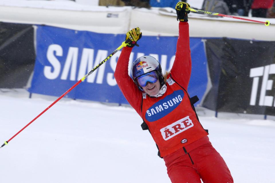 Switzerland's Fanny Smith jubilates after winning the women's FIS Ski Cross World Cup in Are, Sweden, Saturday March 15, 2014. (AP Photo/Janerik Henriksson) SWEDEN OUT