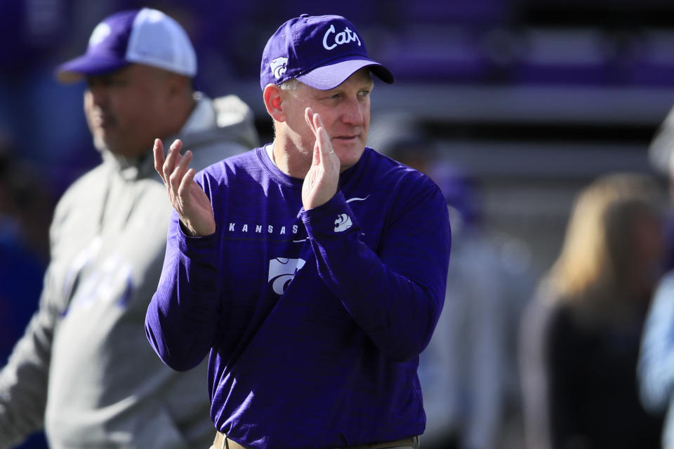 Kansas State head coach Chris Klieman applauds this team before an NCAA college football game against West Virginia in Manhattan, Kan., Saturday, Nov. 16, 2019. (AP Photo/Orlin Wagner)