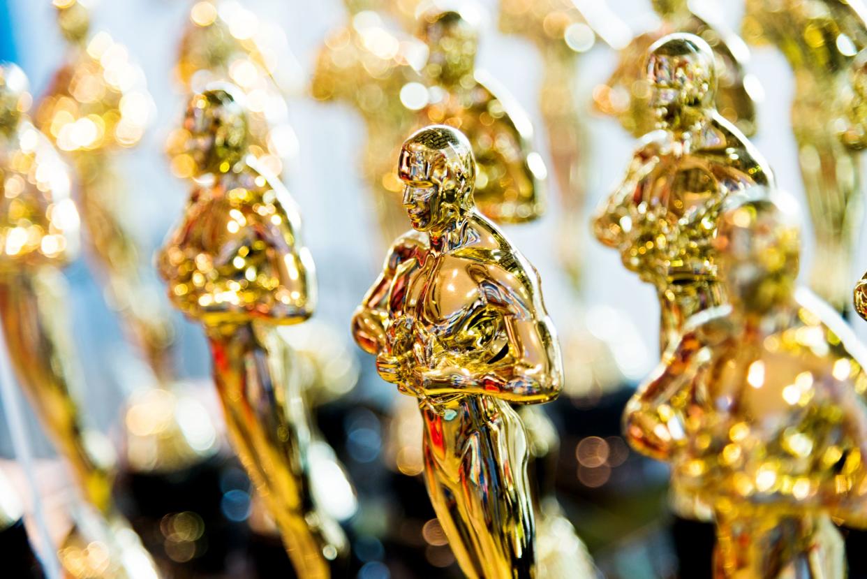 Singapore city, Singapore - January 5, 2016: Large group of Clone/Fake golden award statues in a shop for sale at Universal Studios Singapore.