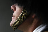 <p>Todd Nix, chief musician and head drum major for Navy, waits in the tunnel before marching on the field for the start of the 113th Army-Navy football game in Philadelphia, Dec. 8, 2012. (Photo: Jacqueline Larma/AP) </p>