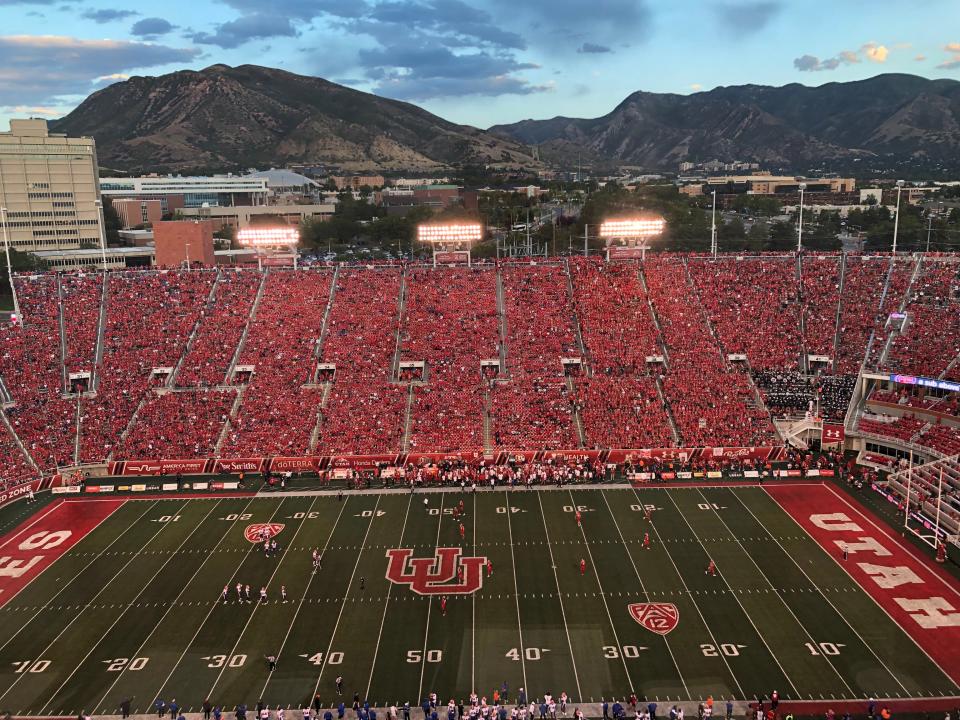 With mountains in the background, the picturesque Rice–Eccles Stadium on the Utah campus in Salt Lake City.