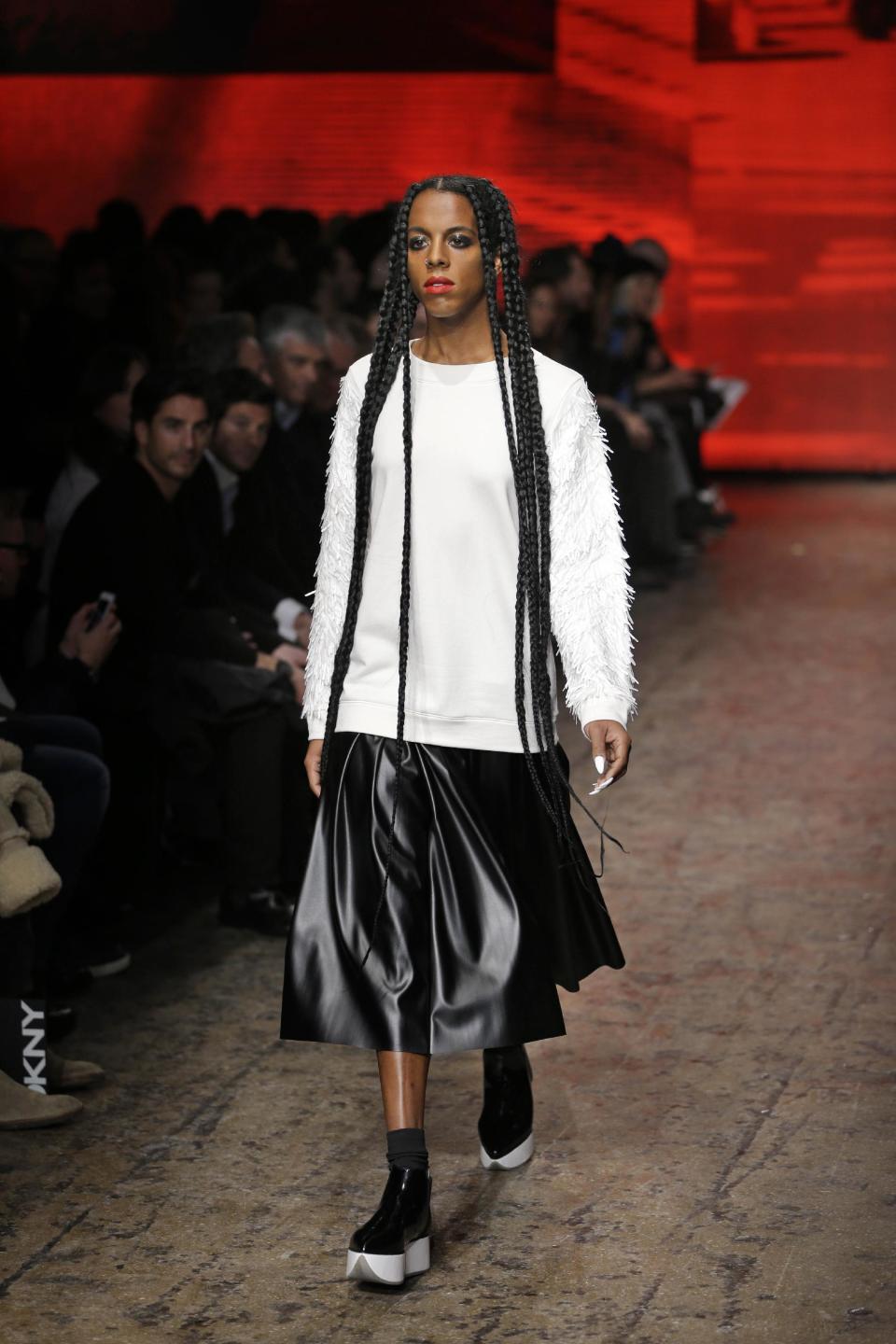 The Fall 2014 DKNY collection is modeled during Fashion Week in New York, Sunday, Feb. 9, 2014. (AP Photo/Seth Wenig)