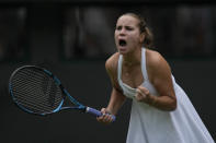 Sofia Kenin of the US celebrates winning a point from Coco Gauff of the US during the first round women's singles match on day one of the Wimbledon tennis championships in London, Monday, July 3, 2023. (AP Photo/Alastair Grant)