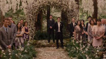 <p> There are so many things I&#xA0;would change about&#xA0;<em>Twilight,&#xA0;</em>but thankfully, Edward and Belle&#x2019;s wedding in&#xA0;<em>Breaking Dawn: Part 1&#xA0;</em>is not one of them. I mean,&#xA0;<em>look&#xA0;</em>at that venue. Those flowers are just beautiful, and that paired with the flower arch and the forest setting is so perfect.&#xA0; </p> <p> I think what also makes this wedding work wonders is Bella&#x2019;s dress. It&#x2019;s&#xA0;<em>so&#xA0;</em>simple. You don&#x2019;t need big puffy dresses or crazy gold embroidery - sometimes, all you need is a simple silk dress, and for Bella, it was perfect. Everything fit together so well that it gave me so many ideas for my future wedding - and I&#x2019;m not even a huge fan of&#xA0;<em>Twilight.&#xA0;</em> </p>