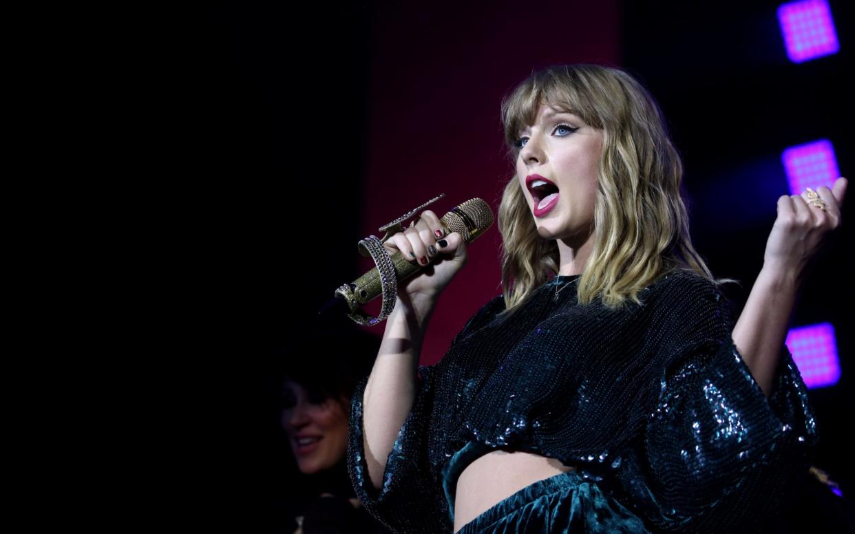 Taylor Swift performing at Capital's Jingle Bell Ball in December - PA