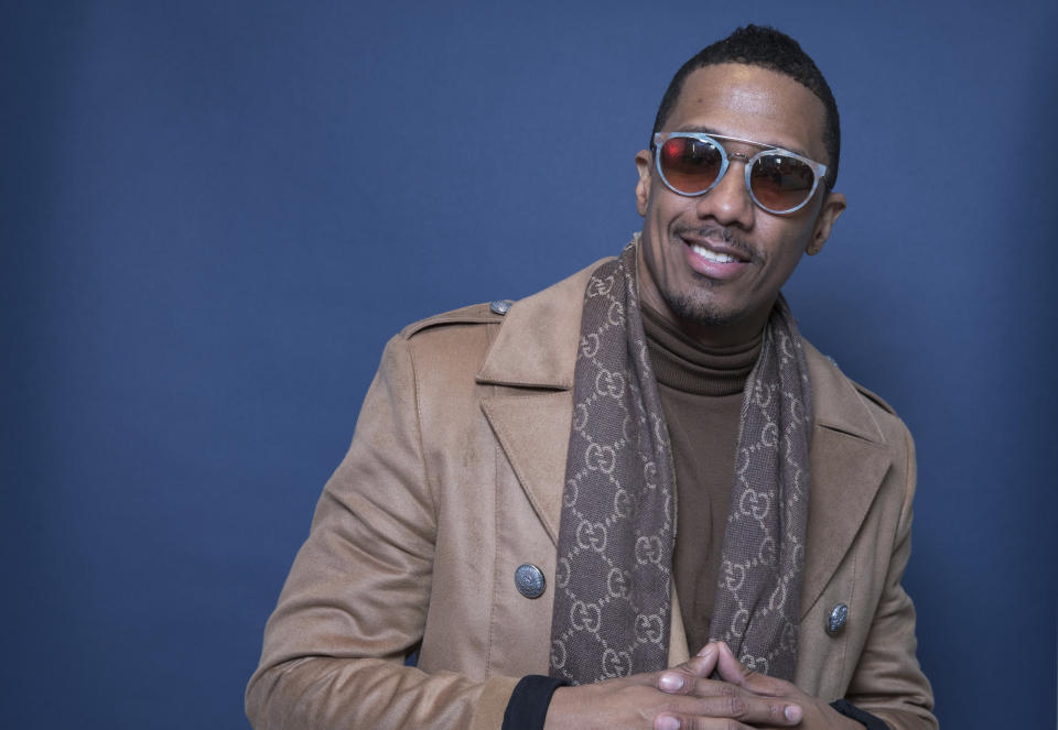 FILE - In this Dec. 10, 2018, file photo Nick Cannon poses for a portrait in New York. A prominent rabbi who met Cannon for more than three hours says the television producer is “genuinely concerned about the hurt” that he caused with his anti-Semitic remarks. Rabbi Abraham Cooper, the Simon Wiesenthal Center’s associate dean, also says that he’s confident that Cannon will use his influence to talk openly about mistakes and work with him to reject messages of hate. (Photo by Amy Sussman/Invision/AP, File)