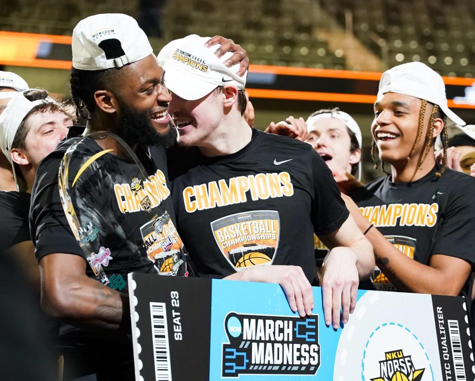 Mar 7, 2023; Indianapolis, IN, USA;  Northern Kentucky Norse guard Trevon Faulkner (22) and Northern Kentucky Norse guard Sam Vinson (2) celebrate after defeating the Cleveland State Vikings to win the Horizon League Championship at Indiana Farmers Coliseum.