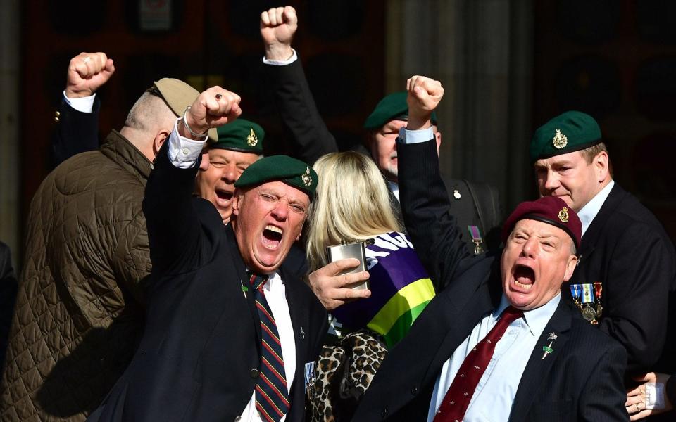 Supporters of Alexander Blackman celebrate outside the Royal Courts of Justice in London - Credit: Dominic Lipinski/PA Wire