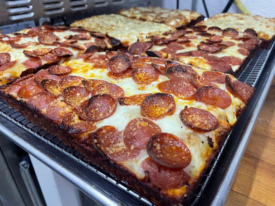 A new restaurant feature Detroit-style pizza.