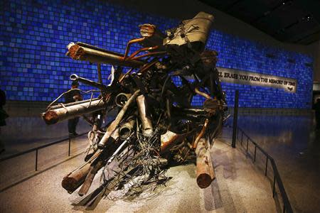 The antenna from the North Tower of the World Trade Center is seen inside the National September 11 Memorial & Museum during a press preview in New York May 14, 2014. REUTERS/Shannon Stapleton