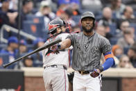 New York Mets' Starling Marte throws his bat after striking out during the eighth inning of a baseball game against the Atlanta Braves, Saturday, May 11, 2024, in New York. (AP Photo/Frank Franklin II)