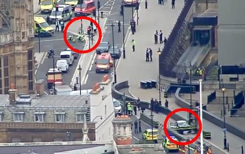 Injured pedestrians can be seen at the top of the shot - around 40 metres from where the car crashed into a barrier - Credit: BBC News/PA 