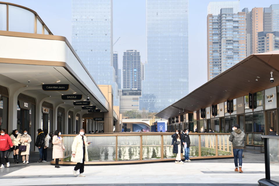 Customers visit the SKP Chengdu, a park-like sunken shopping complex, on the opening day of December 20, 2022, in Chengdu, Sichuan Province of China.