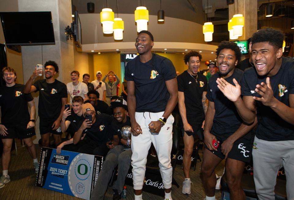 Oregon players celebrate their bracket placement in the 2024 NCAA Tournament during a watch party at Matthew Knight Arena Sunday afternoon. The Ducks will face South Carolina on Thursday in Pittsburgh in the first round of the tournament.