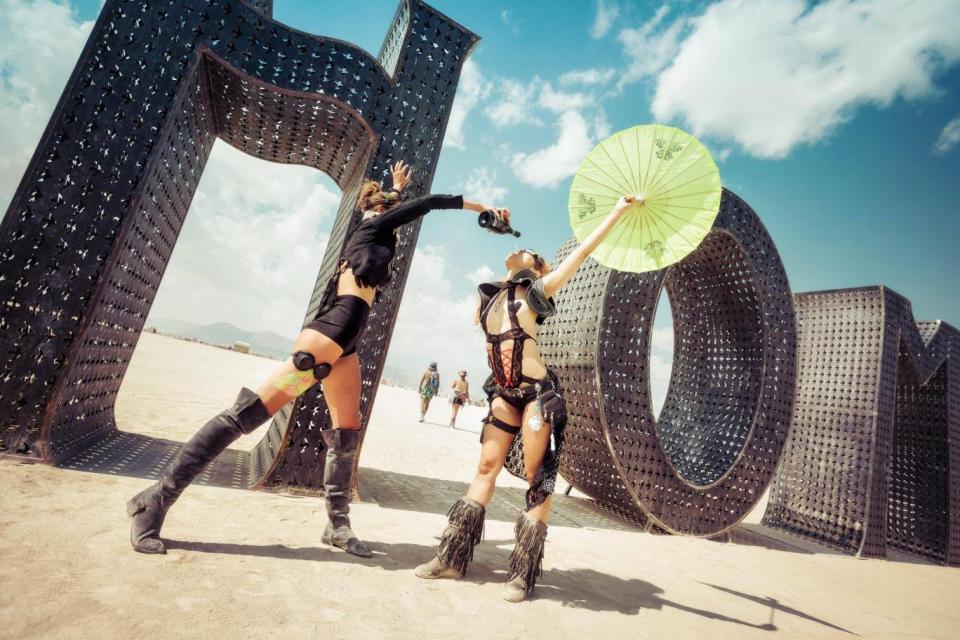 Two Burning Man attendees, taken in 2015 (Lukas Bischoff / Alamy Stock Photo)