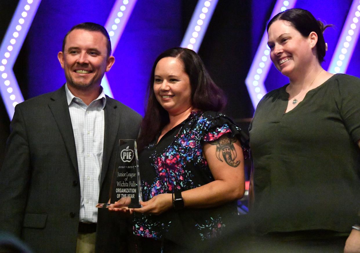 The Junior League of Wichita Falls wins the Organization of the Year award during the PIE appreciation dinner at Faith Baptist Church in Wichita Falls on Tuesday.