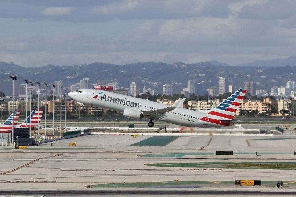 American Blames Delay in Adding More Seats to Jets on Union Woes