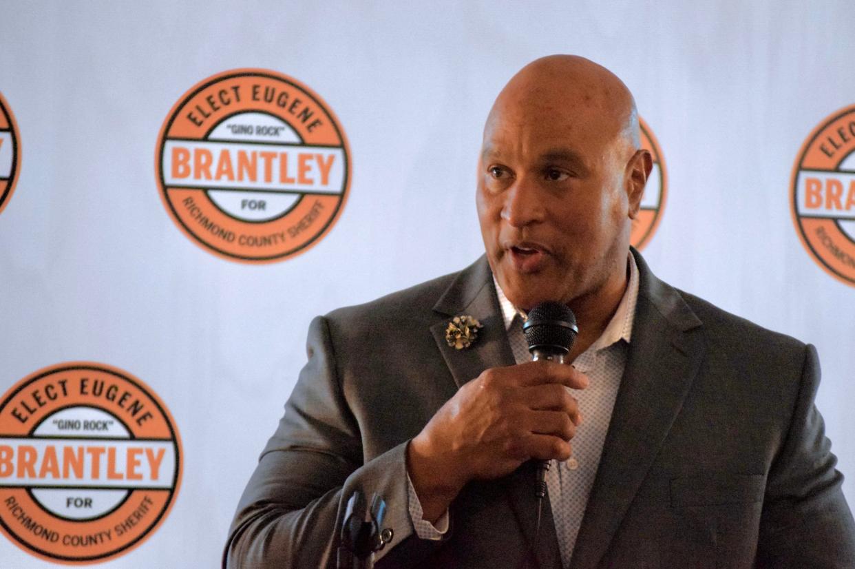 Eugene "Gino Rock" Brantley speaks to a small crowd as he announces his campaign for Richmond County Sheriff at the Hyatt House in downtown Augusta on Thursday, Nov. 2, 2023.