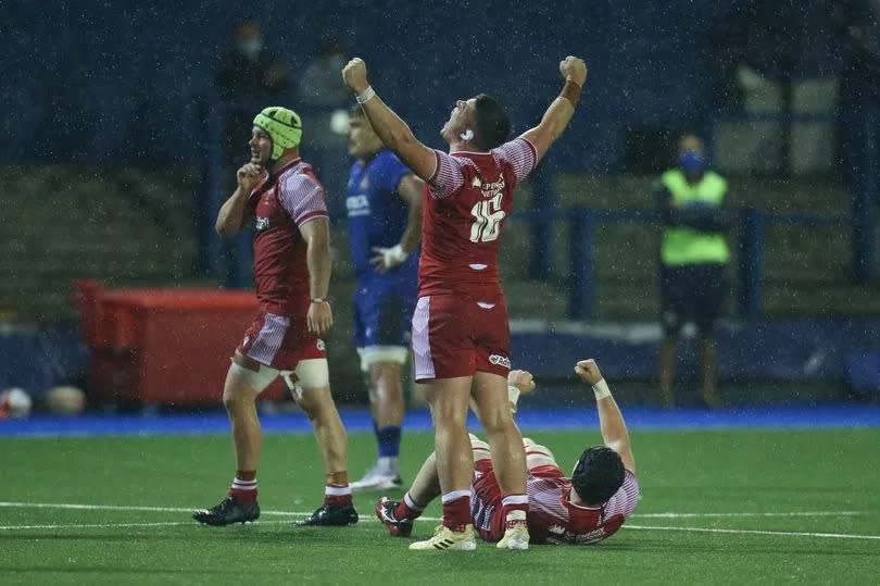 Oli Burrow celebrates while playing for Wales U20s -Credit:Gareth Everett/Huw Evans Agency