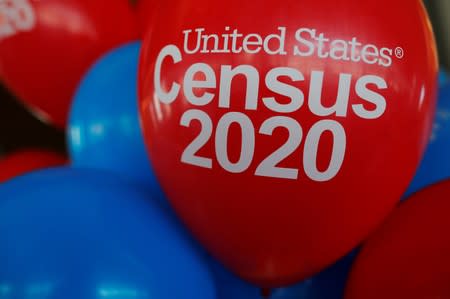 FILE PHOTO: Balloons decorate an event for community activists and local government leaders to mark the one-year-out launch of the 2020 Census efforts in Boston