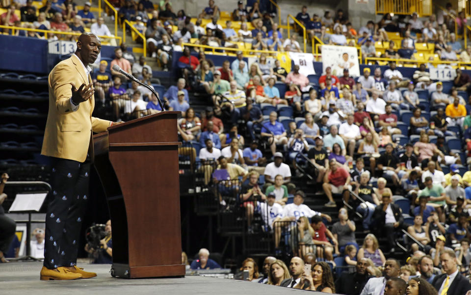 Former NFL wide receiver Terrell Owens delivers his Pro Football Hall of Fame speech Saturday, Aug. 4, 2018, in Chattanooga, Tenn. Instead of speaking at the Hall of Fame festivities in Canton, Ohio, Owens celebrated his induction at the University of Tennessee at Chattanooga, where he played football and basketball and ran track. (AP Photo/Mark Humphrey)