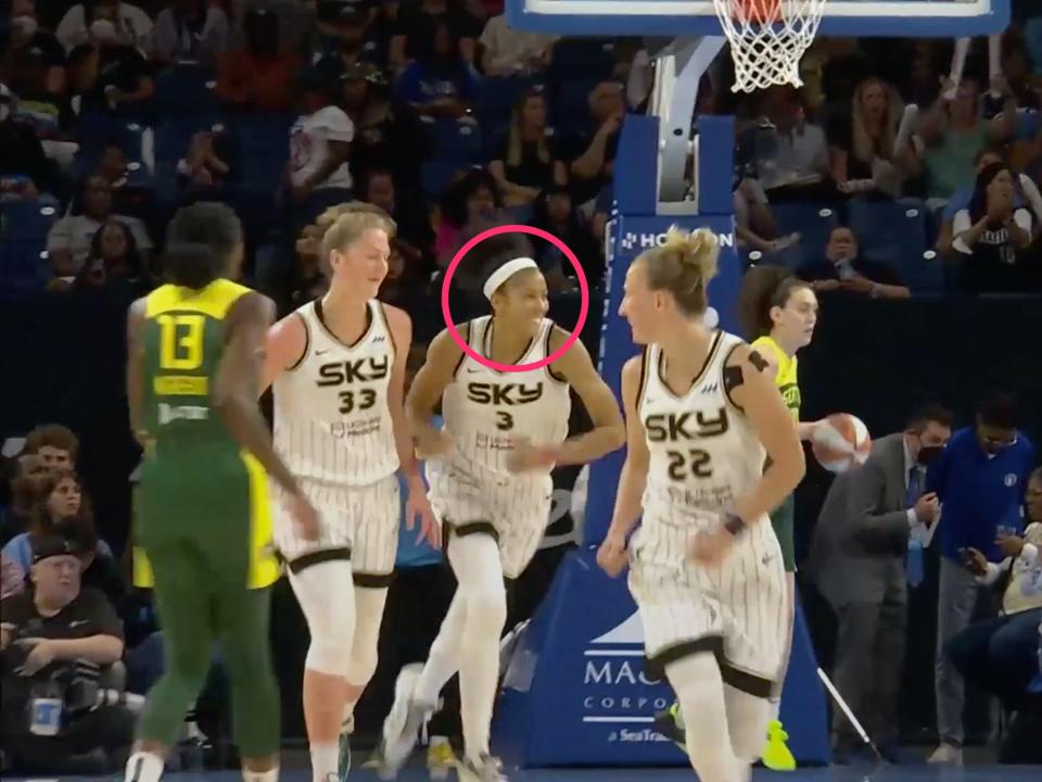 Candace Parker smiles after pulling off the fake.
