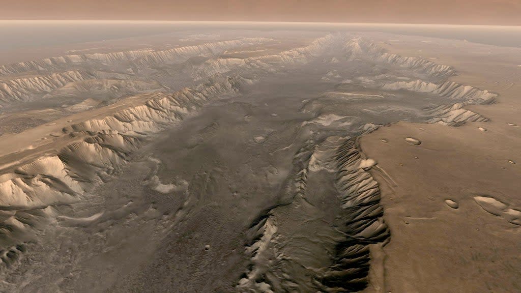 Mars’ own Grand Canyon, Valles Marineris, is shown on the surface of the planet in this composite image made aboard NASA’s Mars Odyssey spacecraft (Getty Images)