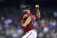 Arizona Diamondbacks starting pitcher Humberto Castellanos throws against the Chicago Cubs during the first inning of a baseball game Sunday, May 15, 2022, in Phoenix. (AP Photo/Ross D. Franklin)