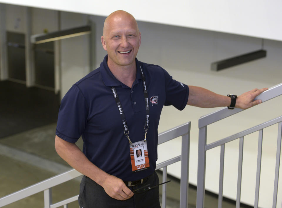 FILE - In this June 6, 2015, file photo, Columbus Blue Jackets general manager Jarmo Kekalainen poses for a photo as he watches NHL draft prospects test during the NHL Combine in Buffalo, N.Y. Where many raise concern, Kekalainen sees only opportunity regarding the uncertain state of the Blue Jackets' roster a week before the NHL's free agency signing period opens. (AP Photo/Gary Wiepert, File)