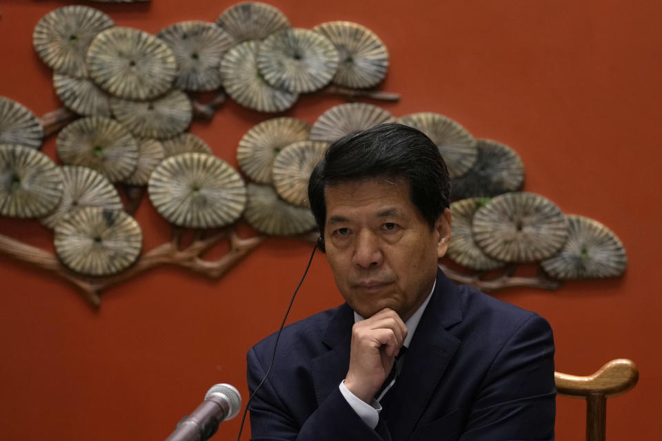 China's Ukraine envoy Li Hui waits for a question from journalists in Beijing, Friday, June 2, 2023. Li appealed Friday to other governments to "stop sending weapons to the battlefield" and hold peace talks but gave no indication that his trip to the region made any progress toward a settlement. (AP Photo/Ng Han Guan)