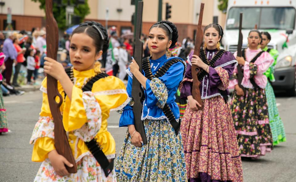 Members of Ballet Folklorico El Mestizaje de Salida marches in El Concilio's annual Cinco de Mayo parade and festival in downtown Stockton on Sunday, May, 7, 2023.