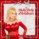 This cover image release by Butterfly Records shows "A Holly Dolly Christmas" by Dolly Parton. (Butterfly Records via AP)