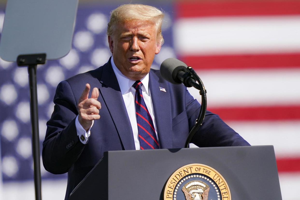 President Donald Trump speaks during a campaign rally at Mariotti Building Products: AP